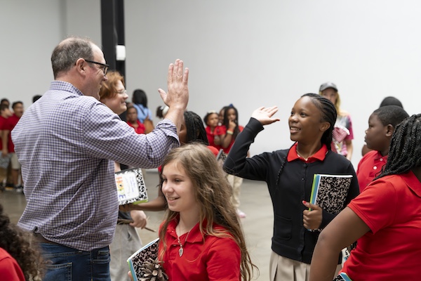 Mike McFalls with art students