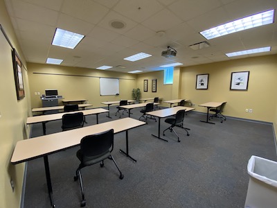 Classroom, long desks, chairs