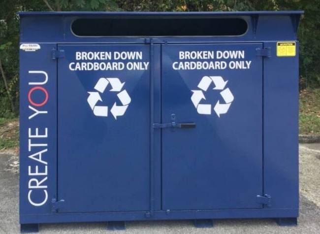 Cropped blue cardboard bin